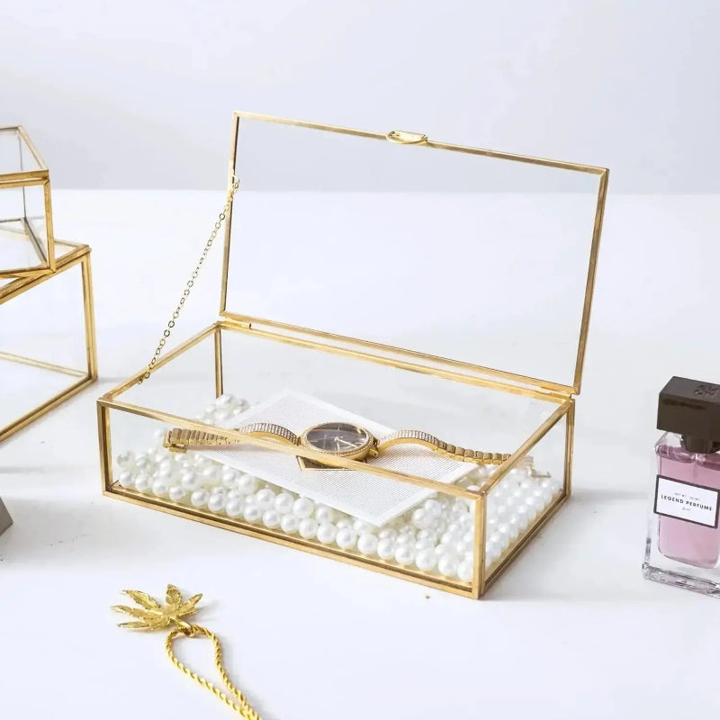 Boîte en verre et métal doré pour bijoux